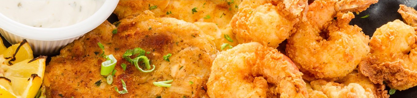 Oak Grove Fish House fried shrimp and Charleston crab cakes with lemon and tartar sauce